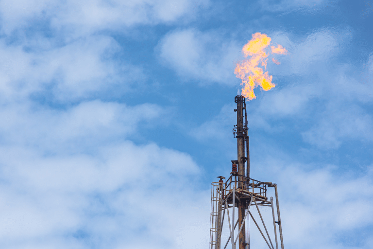 Flare tower burning on an industrial site for Explicit flare efficiency measurement survey