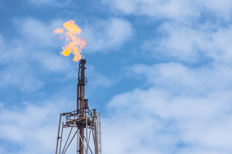 Flare tower burning on an industrial site for Explicit flare efficiency measurement survey